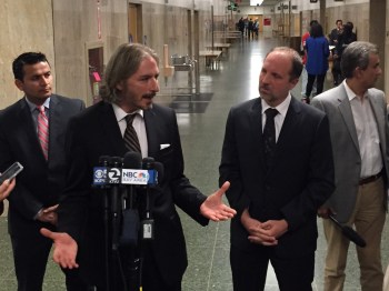 Juan Francisco Lopez-Sanchez's attorneys, Matt Gonzalez and Francisco Ugarte, speak to reporters after the conclusion of a preliminary hearing at which a judge ruled there is sufficient evidence to hold their client to answer second-degree murder charges for the killing of Kathryn Steinle. (Alex Emslie/KQED)